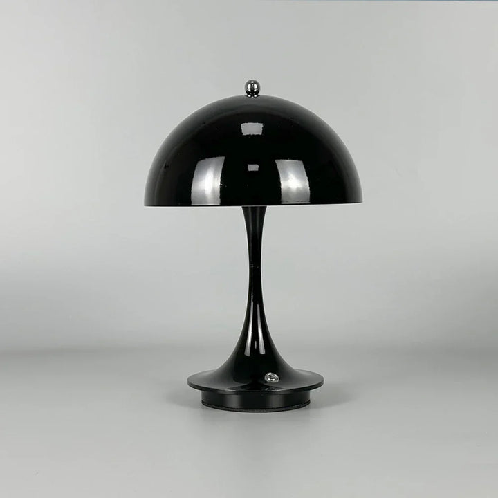 Black dome-shaped table lamp with a sleek, curved stem and circular base.