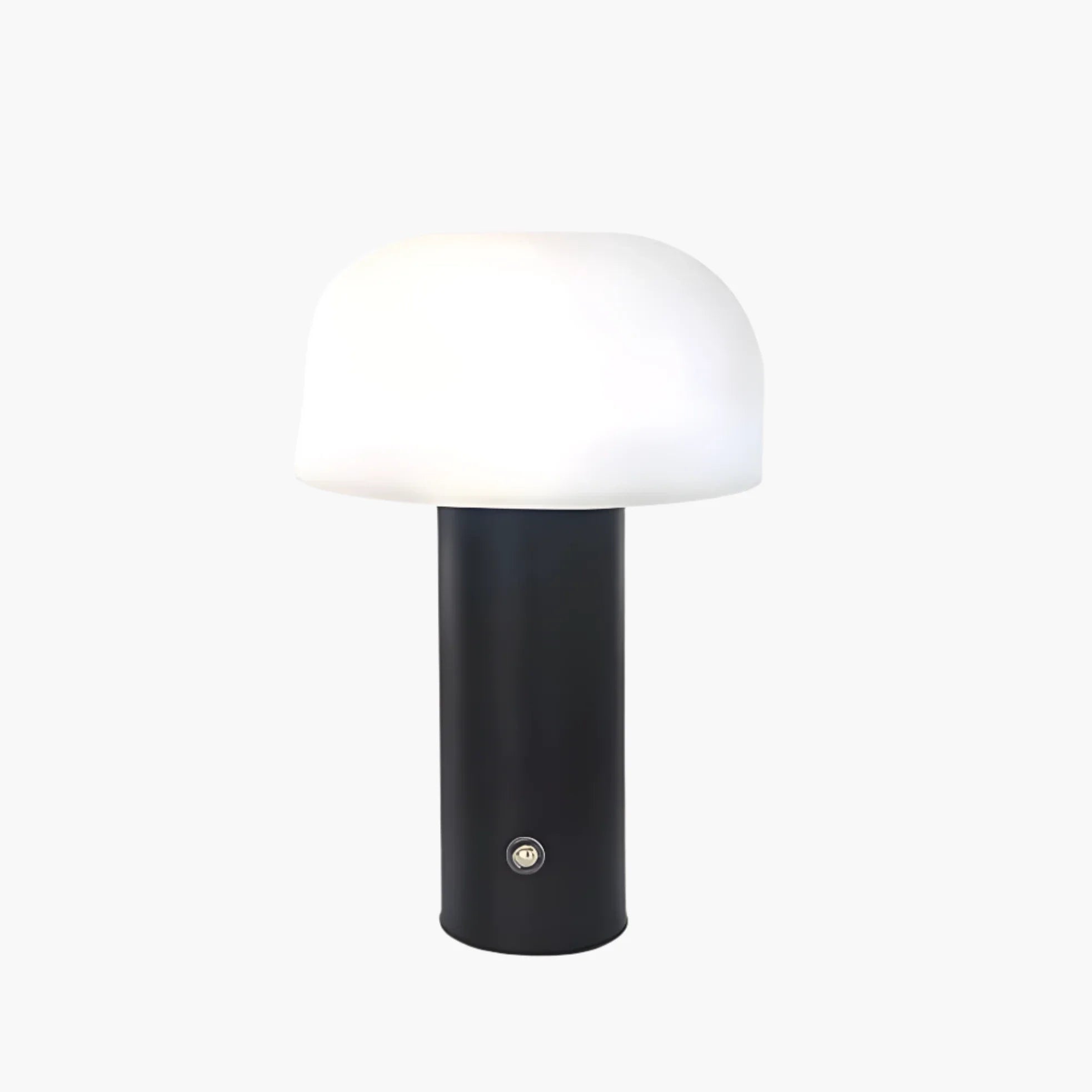 Modern table lamp with a black cylindrical base and white dome-shaped shade.